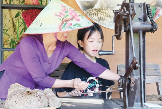 Experiencing traditional crafts when visiting Hue 